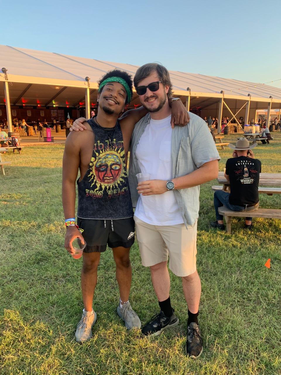 Coworkers Josh Rondon, left, and Ryan O’Malley, right, were taking in their first Bourbon & Beyond Thursday, eagerly awaiting The Killers to take the stage Friday.