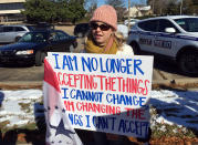 <p>Keller White of Jackson, Miss., protests Saturday, Dec. 9, 2017, against the visit of President Donald Trump in Jackson, Miss. (Photo: Jeff Amy/AP) </p>