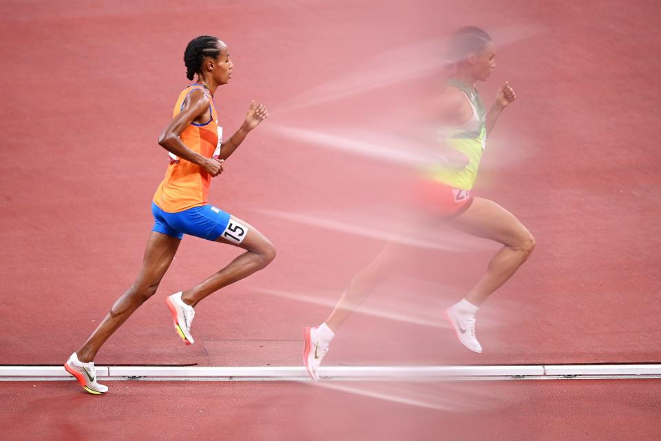 Dutch runner Sifan Hassan chases an opponent in the 10,000m final at the Tokyo Olympics.