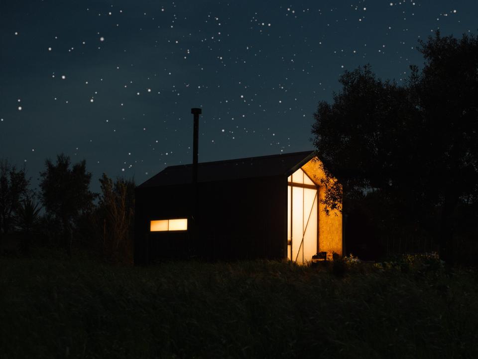The cabin at night.