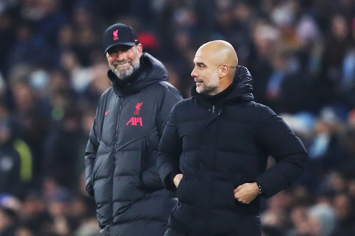 Jurgen Klopp, left, and Pep Guardiola have always shared a healthy respect (PA)