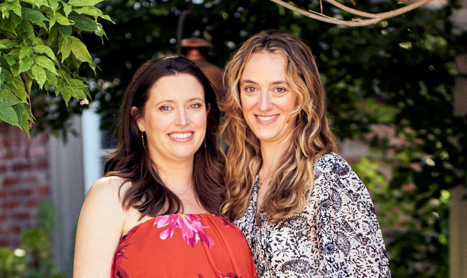 "We do often get confused for sisters and that is tough," jokes Lauren Pomerantz, right, pictured with wife Elizabeth Higgins Clark.