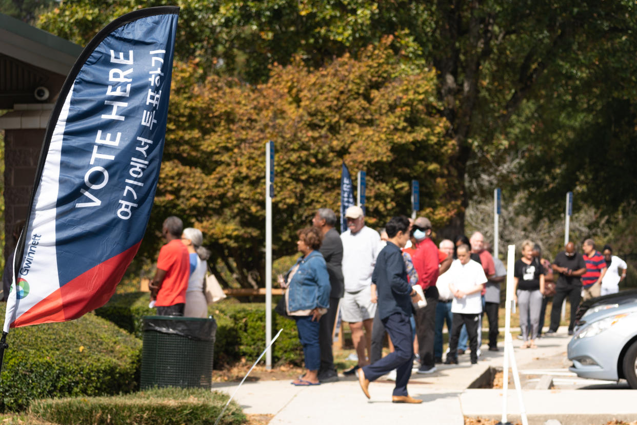 Voters wait to cast their ballots in Atlanta