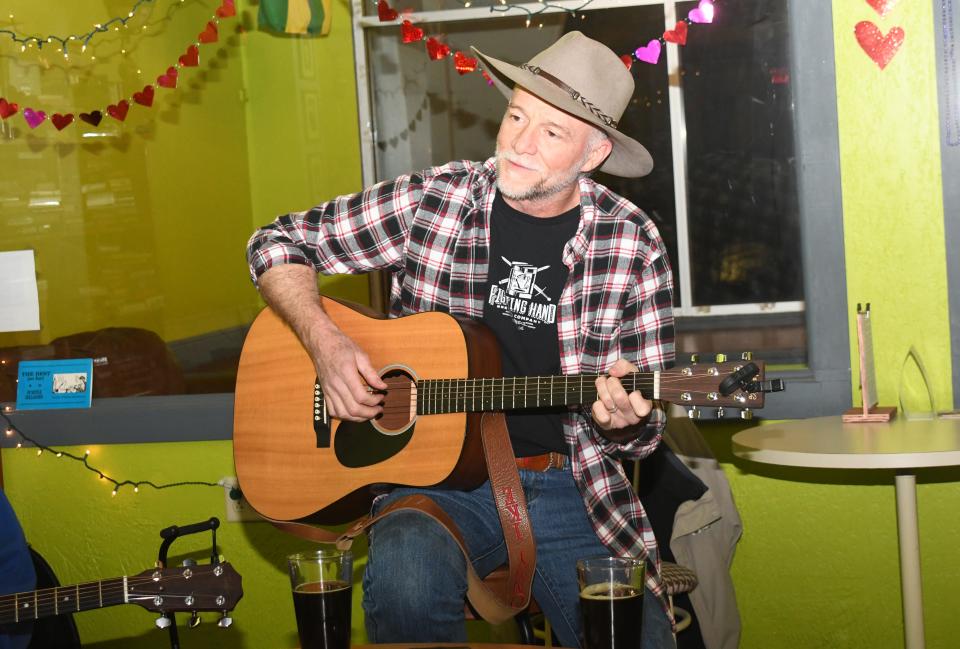 Tommy Ike Hailey sings "Fallin' In Love," a song he wrote about his wife, Debra Jo, at the CenLa Songwriters Circle.