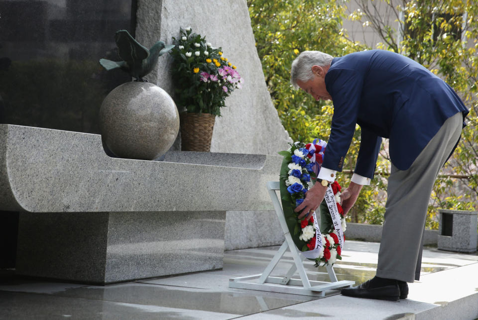 U.S. Secretary of Defense Chuck Hagel lays a wreath at the JSDF Memorial at the Japanese Ministry of Defense headquarters, Sunday, April 6, 2014, in Tokyo, Japan. Secretary Hagel is visiting Japan, China and Mongolia, his fourth trip to Asian nations since taking office. (AP Photo/Alex Wong, Pool)