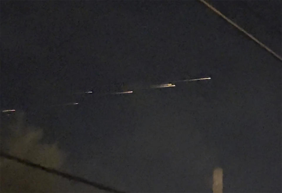 This image from video provided by Jaime Hernandez shows streaks of light travelling across the sky over the Sacramento, Calif., area on Friday night, March 17, 2023.  / Credit: Jaime Hernandez / AP