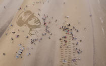 <p>A sand drawing on Ayr Beach of Second Lieutenant Walter Tull, who was Britain’s second black professional footballer who had signed up with Rangers, and the first black officer in the British Army. (SWNS) </p>