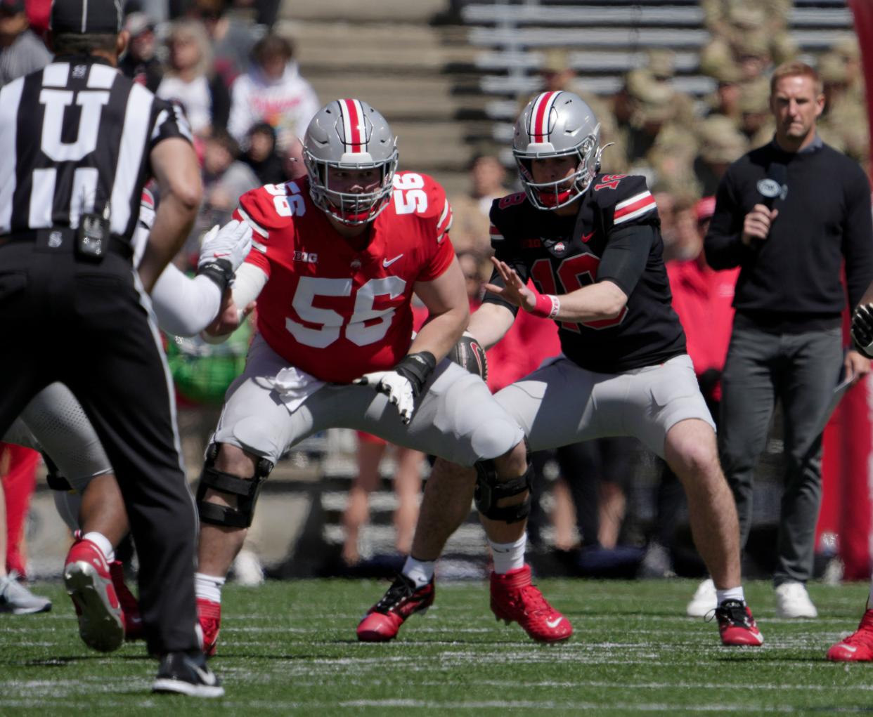 April 13, 2024; Columbus, Ohio, USA; 
Ohio State Buckeyes center Seth McLaughlin (56) blocks for quarterback Will Howard (18) after the snap during the first half of the LifeSports spring football game at Ohio Stadium on Saturday.
