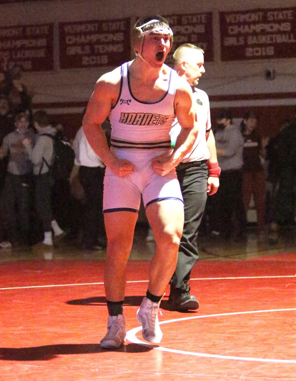 Oliver Orvis of Essex reacts after his dramatic last second win over Mount Anthony's Aaron Johnson in the 182 pound final at the State Championships on Sunday night at CVU.