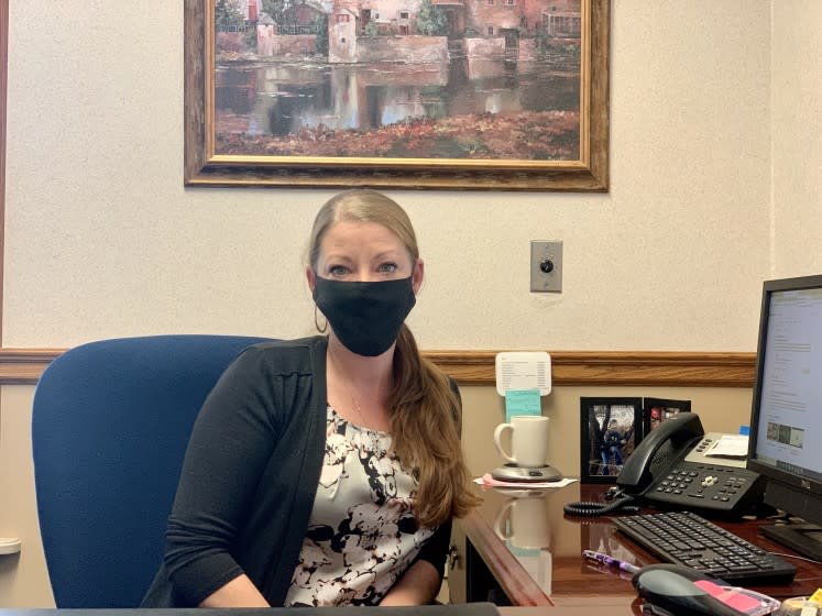 Jami Colich, pictured in her office at a community bank in New Castle, Penn., said the division in her town is "palpable."