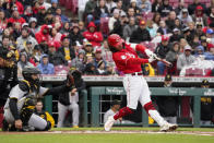 Cincinnati Reds' Jonathan India, right, hits a solo home run during the first inning of a baseball game against the Pittsburgh Pirates, Saturday, April 1, 2023, in Cincinnati. (AP Photo/Joshua A. Bickel)