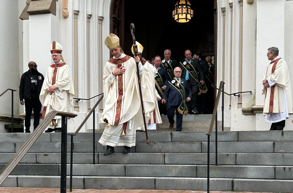 Mass let out at around 9:30 a.m. at The Cathedral Basilica of St. John the Baptist. Savannah diocese bishop Stephen Parkes and former bishop Kevin Boland lead the procession out of the church doors.
