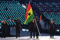 <p>Flag bearer Akwasi Frimpong of Ghana leads the team, who wear jackets featuring paneling with the nation’s colors during the opening ceremony of the 2018 PyeongChang Games. (Photo: Quinn Rooney/Getty Images) </p>