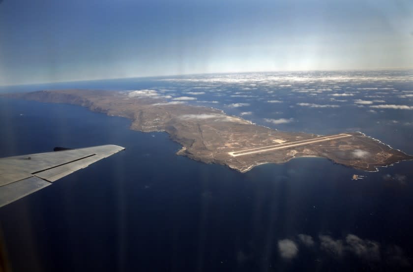 San Clemente Island, viewed from a shuttle aircraft that regularly flies military and civilian personnel to the U.S. Navy-owned land mass 68 miles from San Diego. The military airstrip is seen at the northern end. The southern end has the only remaining ship-to-shore bombardment range in the U.S. The Navy has supported an extensive ecological restoration of endangered plants and animals on the island. [For the record, July 24, 2013: An earlier version of this caption incorrectly said the military airstrip was at the southern end of the island, and the bombardment range to the north.]