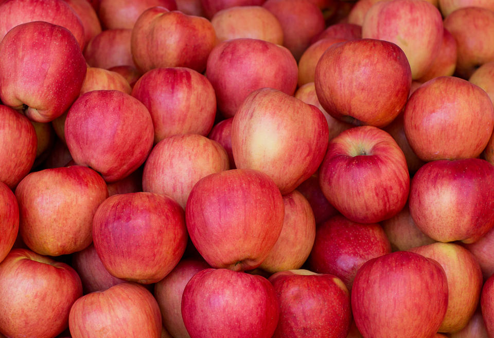 a bunch of red apples close-up