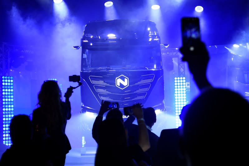 Italian-American industrial vehicle maker CNH's truck unit Iveco presents its new full-electric and hydrogen fuel-cell battery trucks in partnership with U.S. Nikola, at an event in Turin