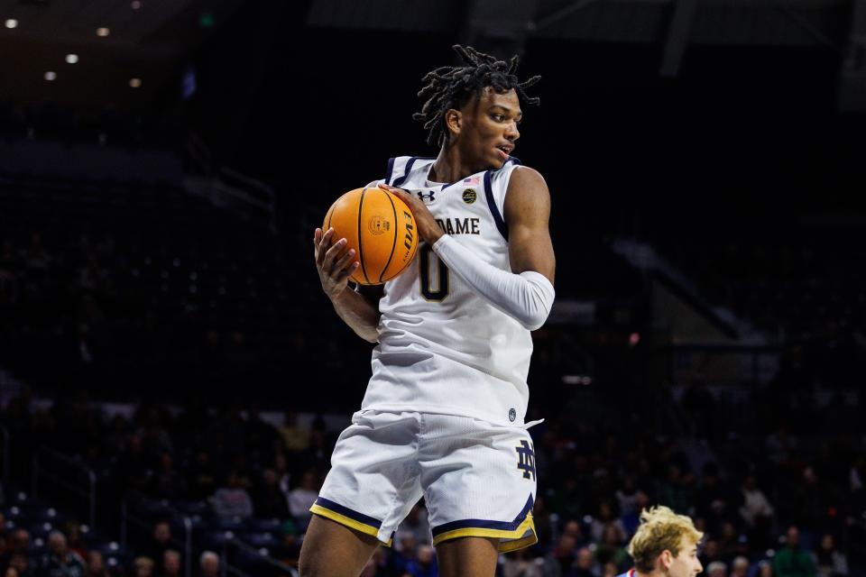 Notre Dame forward Carey Booth (0) grabs the rebound during the Hanover College-Notre Dame NCAA Menâ€™s basketball game on Wednesday, November 01, 2023, at Purcell Pavilion in South Bend, Indiana.