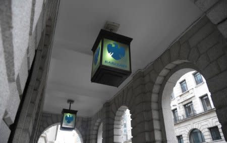 The logo of Barclays bank is seen on glass lamps outside of a branch of the bank in the City of London financial district in London September 4, 2017. REUTERS/Toby Melville