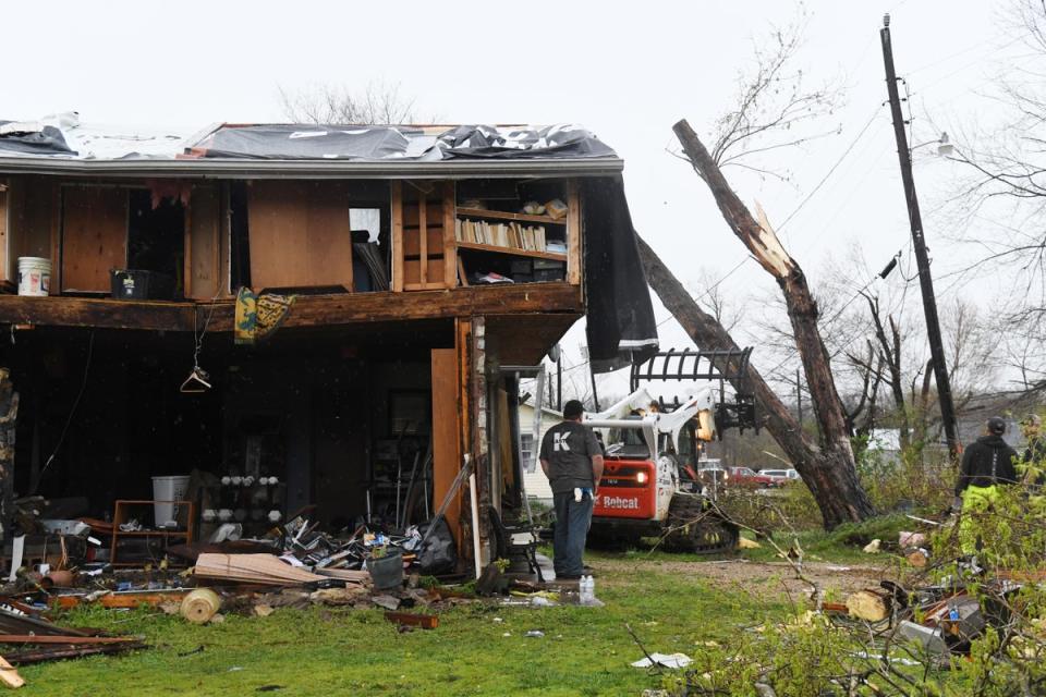 Residents clean up after a tornado touched downon April 5, 2023 in Glenallen, Missouri. At least five people have been killed and multiple others injured (Getty Images)