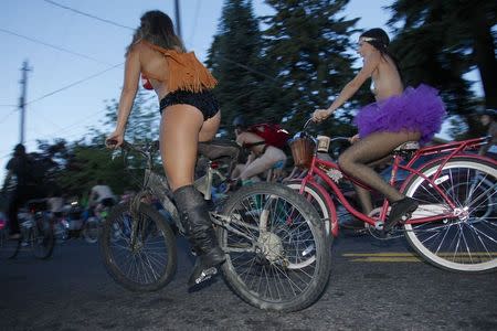 Cyclists pour into the streets of Portland for the 11th annual World Naked Bike Ride June 7, 2014. REUTERS/Steve Dipaola