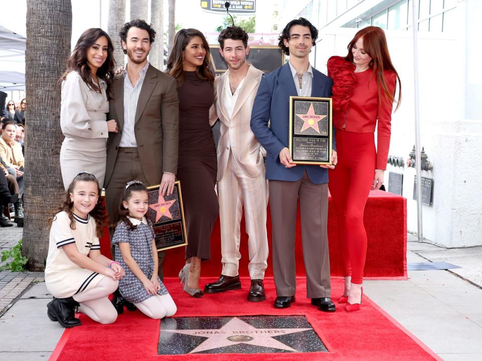 the jonas brothers honored with star on the hollywood walk of fame