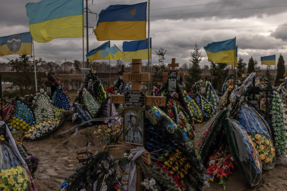 The graves of Ukrainian soldiers killed during the Russian invasion of Bucha, a suburb of Kyiv  (Getty)