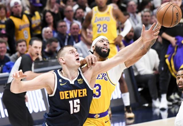 DENVER, CO - MAY 18: Denver Nuggets center Nikola Jokic, left, and Los Angeles Lakers forward Anthony Davis.