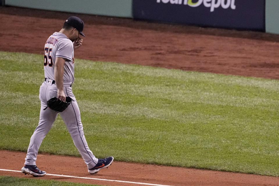 Houston Astros starting pitcher Jose Urquidy leaves the game against the Boston Red Sox during the second inning in Game 3 of baseball's American League Championship Series Monday, Oct. 18, 2021, in Boston. (AP Photo/Robert F. Bukaty)