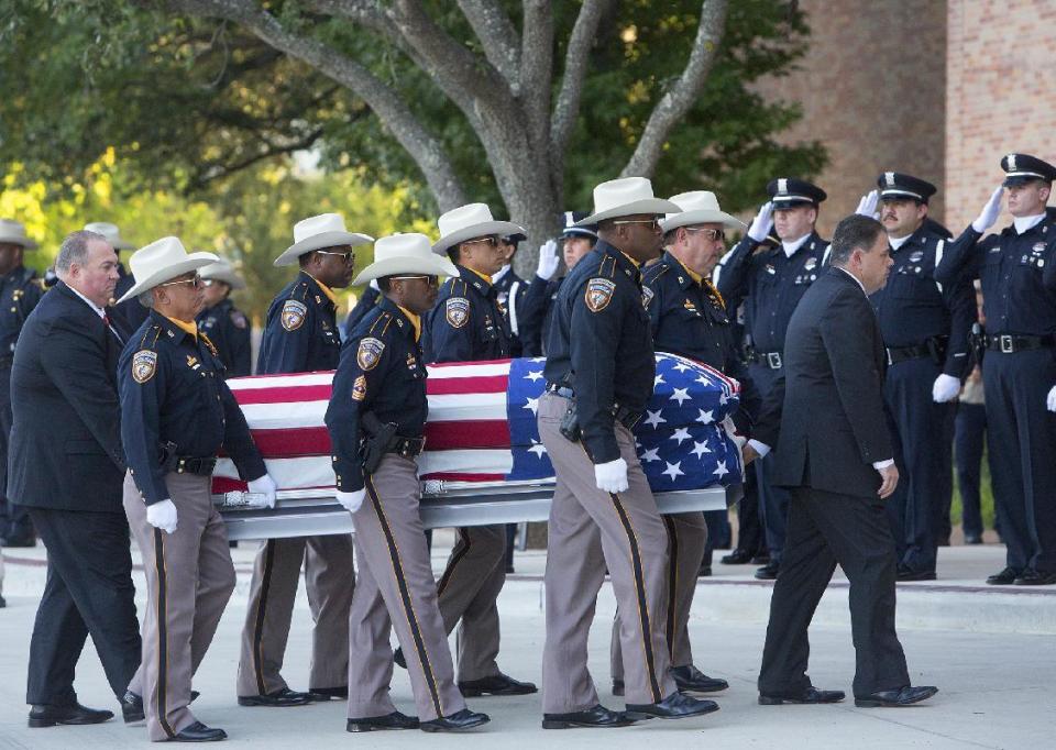 Miles en Houston rindieron homenaje al policía Darren Goforth, asesinado a sangre fría en Houston. (AP)