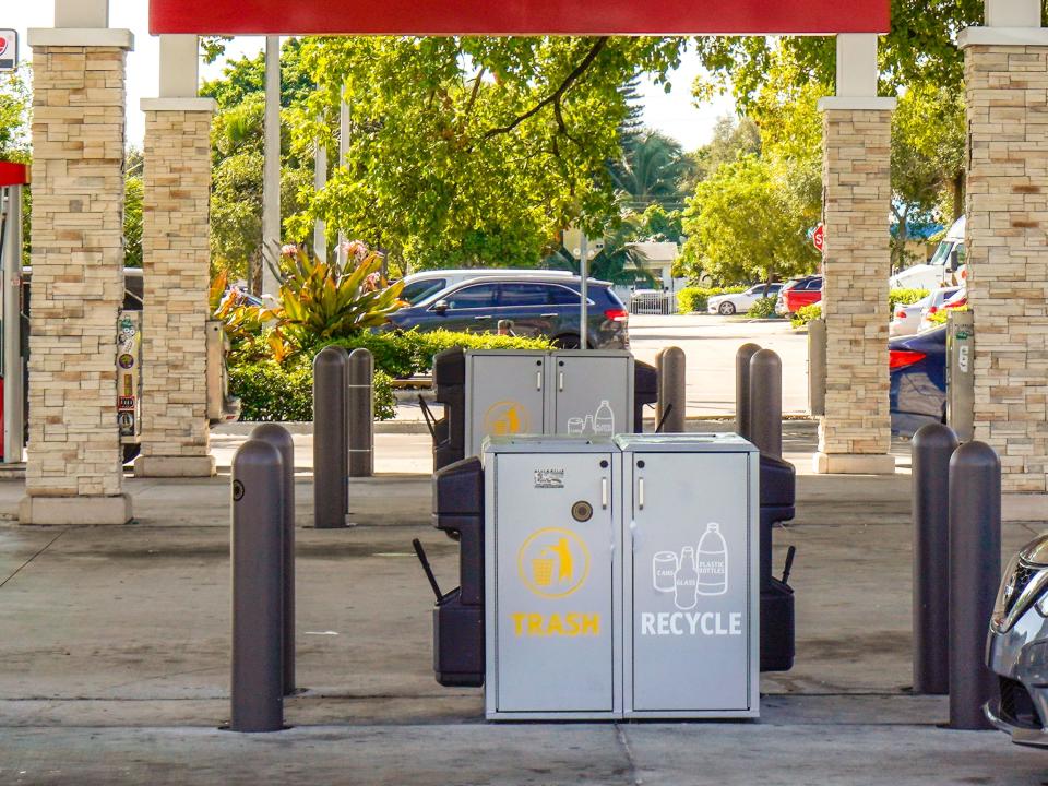 Trash and recycling bins at gas stations