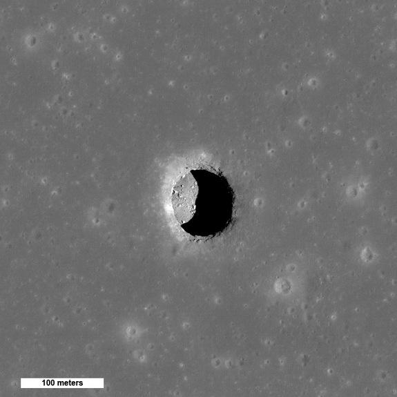 An image from the LRO shows a pit crater on Mare Tranquillitatis, with boulders lying on an otherwise smooth floor.