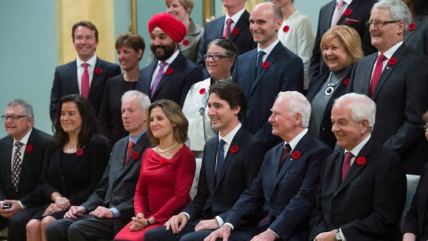 David Johnston joins Prime Minister Justin Trudeau and his new cabinet for a photo at Rideau Hall, in Ottawa, on Nov. 4, 2015.