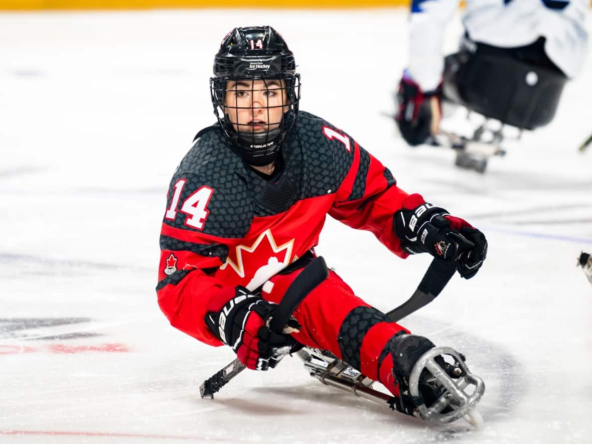 Raphaelle Tousignant, the first woman to play for Canada's national Para hockey team, in action against South Korea at the world championships in Moose Jaw on Monday. (The Canadian Press/HO-Hockey Canada Images/Erica Perreaux  - image credit)