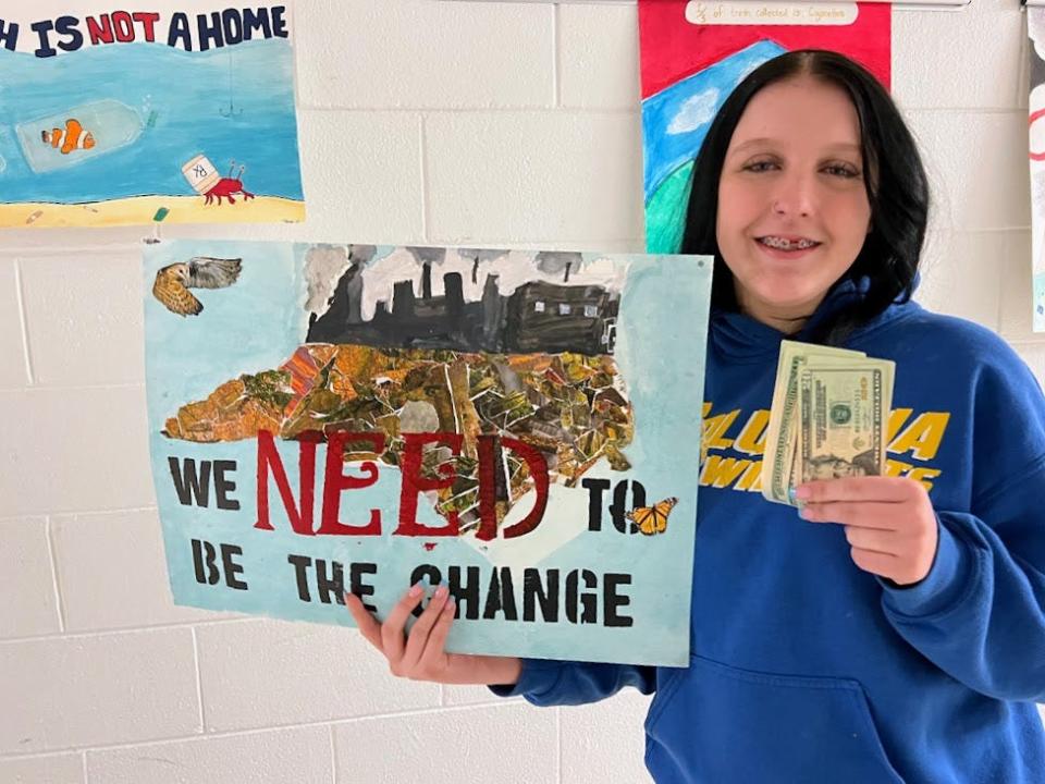 Madison Brower was awarded $100 as her peers voted her poster as the top poster to be displayed at the April 30 Great Madison County Litter Sweep Contest award ceremony at Laurel Community Center.
