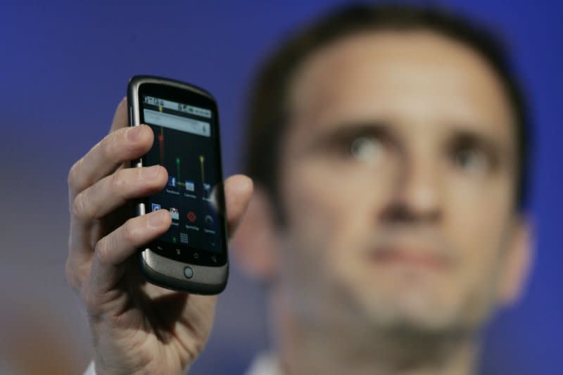 Mario Queiroz, vice president of product management for Google, holds up the Nexus One smartphone running on the Google Android platform January 5, 2010. On November 5, 2007, Google unveiled the Android mobile operating system. File Photo by Robert Galbraith/UPI