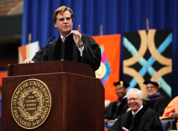 Aaron Sorkin, screenwriter, producer and playwright, points as he looks to the crowd during his address at the 2012 Syracuse University Commencement at Syracuse University on May 13, 2012 at the Carrier Dome in Syracuse, New York. (Photo by Nate Shron/Getty Images)