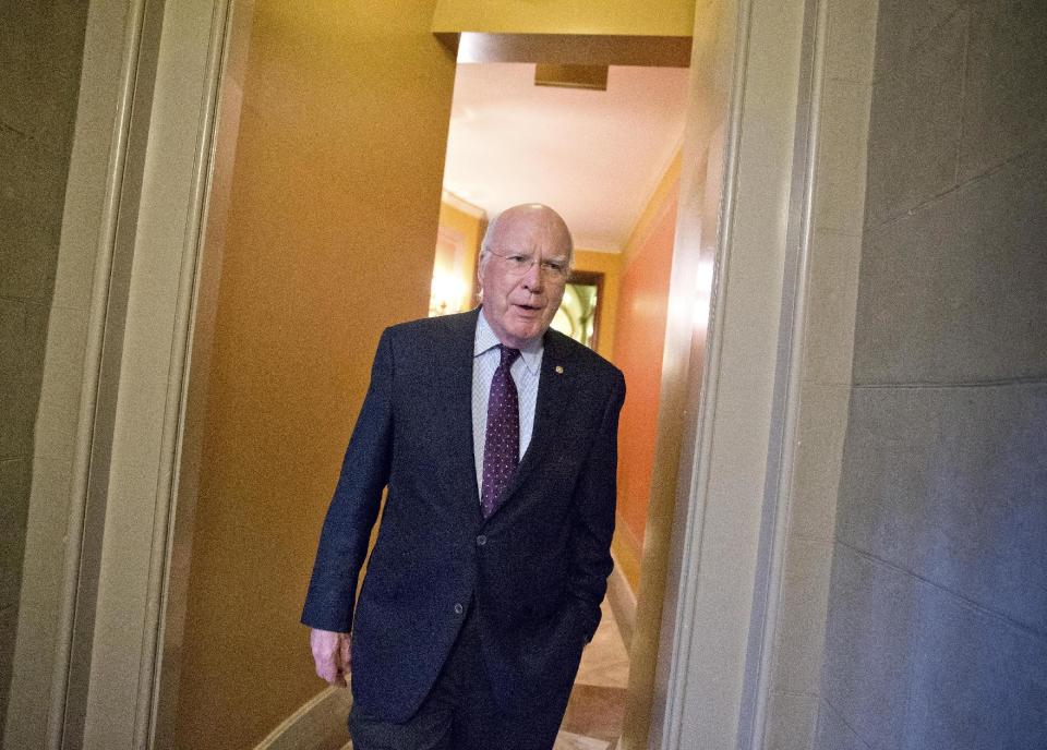 FILE - This Oct. 14, 2013 file photo shows Senate Judiciary Committee Chairman Patrick Leahy, D-Vt., walking through a corridor at the Capitol in Washington. Leahy said he's “concerned the growing trend toward relying upon FOIA exemptions to withhold large swaths of government information is hindering the public's right to know." (AP Photo/J. Scott Applewhite)