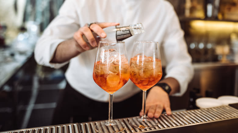 aperol spritzes being prepared