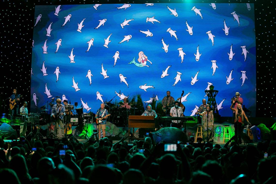 Jimmy Buffett and his Coral Reefer Band perform “Fins” during their concert at the iTHINK Financial Amphitheatre in West Palm Beach, Florida on Thursday, December 9, 2021. A team of scientists from the University of Miami Rosenstiel School named a new species of a member of a group of crustaceans, gnathiid isopods, the Gnathia jimmybuffetti after the singer-songwriter. MATIAS J. OCNER/mocner@miamiherald.com