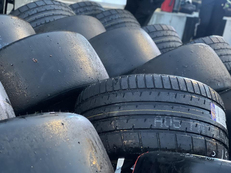 A mix of wet-weather and slick Goodyear tires sit on pit road at Chicago.