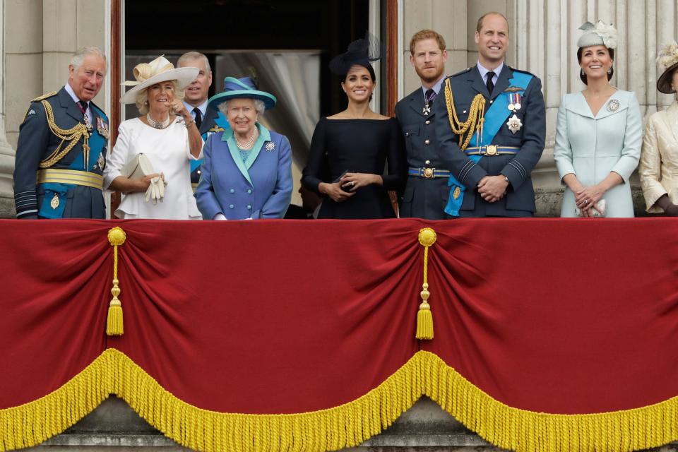 Queen Elizabeth II and members of the royal family gathered on the balcony of Buckingham Palace to watch a flypast of Royal Air Force aircraft on July 10, 2018. From left, Prince Charles, Duchess Camilla of Cornwall, Prince Andrew, Duchess Meghan of Sussex, Prince Harry, Prince William and Duchess Kate of Cambridge.