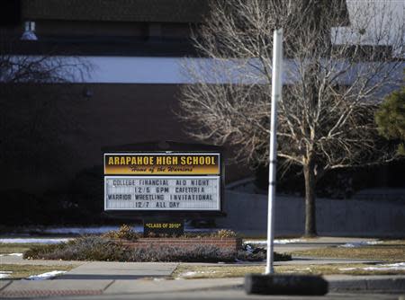 A sign announcing events at Arapahoe High School is seen after a student opened fire in the school in Centennial, Colorado