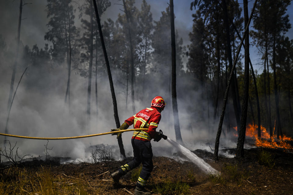 Firefighters battle a wildfire in Carrascal, Proenca a Nova on August 6, 2023.