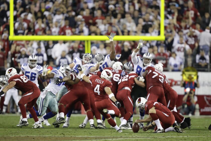 Arizona Cardinals place kicker Jay Feely (4) kicks the game winning field goal