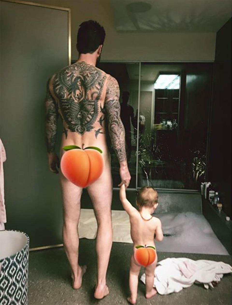 Behati Prinsloo Shares a Cheeky Photo of Adam Levine and Daughter