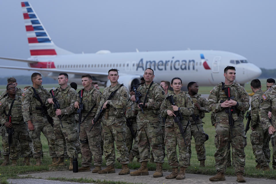 Members of the Texas National Guard prepare to deploy to the Texas-Mexico border in Austin, Texas, Monday, May 8, 2023. The Title 42 policy, a federal rule that has allowed the government to strictly regulate border entries, is set to expire this week. (AP Photo/Eric Gay)