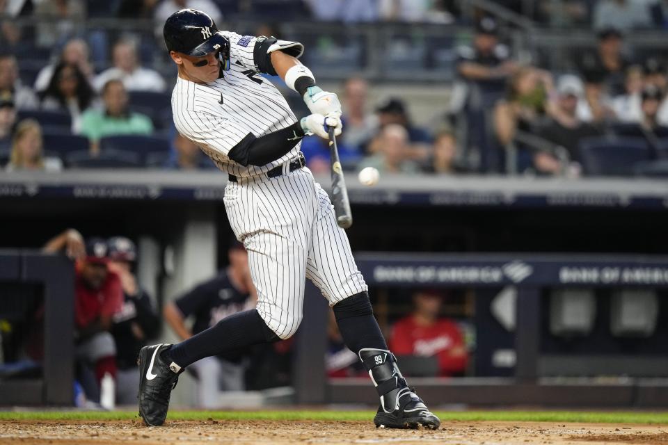 New York Yankees' Aaron Judge hits a grand slam against the Washington Nationals during the second inning of a baseball game Wednesday, Aug. 23, 2023, in New York. (AP Photo/Frank Franklin II)