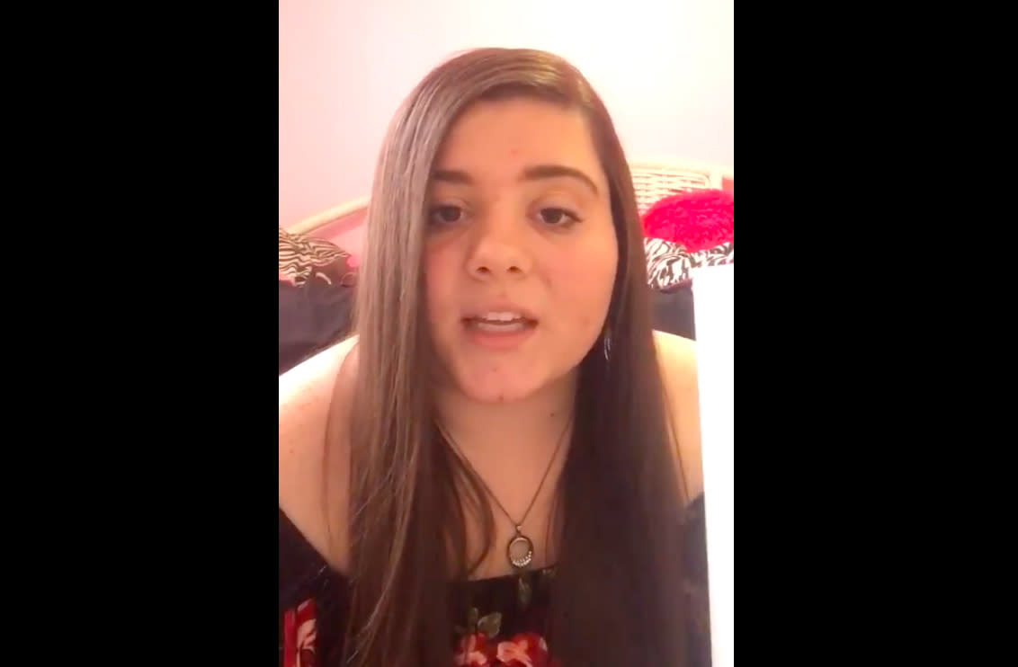 Gabby Helsinger, in a video shared on her mother’s Facebook page, claims she was suspended for placing Bible versus around her high school in response to gay pride flags. (Photo: Tina Helsinger via Facebook)