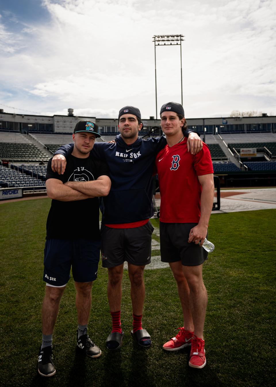 From left, Portland Sea Dogs players Kyle Teel, Marcelo Mayer and Roman Anthony pose for a picture prior to a game Friday at Hadlock Field in Portland, Maine.