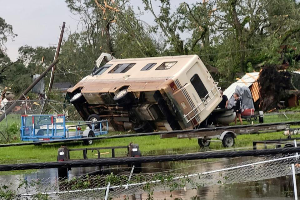 A mobile home is turned on its side off Main Street in Moss Point, Mississippi, after a tornado struck the town this month (AP)